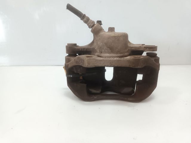 7701207786 RENAULT Pinza de freno delantera izquierda  en stock Huelva