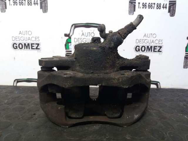 7701207787 RENAULT Pinza de freno delantera derecha  en stock Huelva