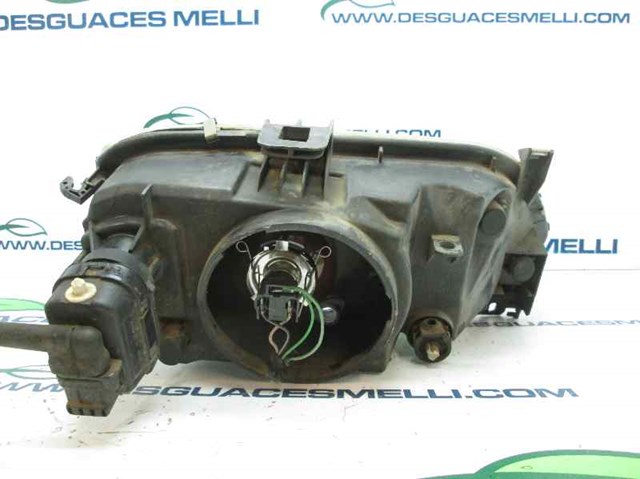 7701672734 Faro izquierdo  en stock Sabadell