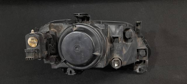 7701672734 Faro izquierdo  en stock Granada