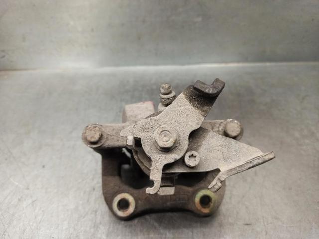 7711135736 RENAULT Pinza de freno trasera izquierda  en stock Córdoba