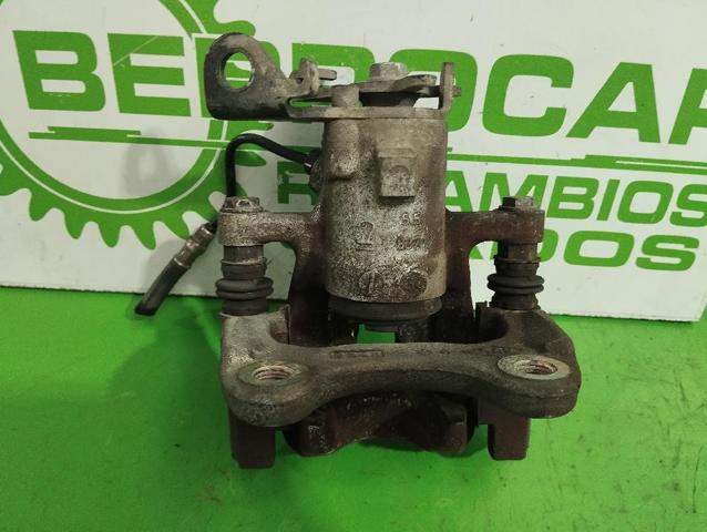 7711135736 Pinza de freno trasera izquierda  en stock Castellón