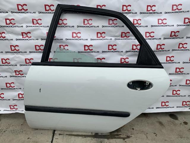 Puerta delantera izquierda Renault Laguna segundo mano en Madrid