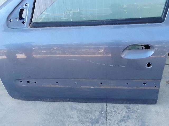 Puerta Renault Clio segundo mano en Madrid