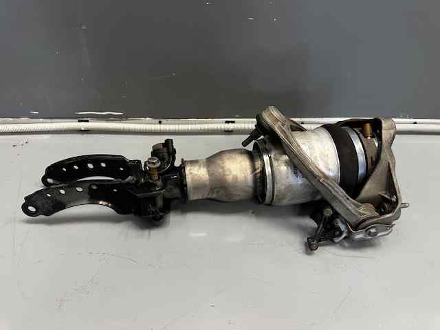 Amortiguador frontal izquierdo 7L6412021AG VAG