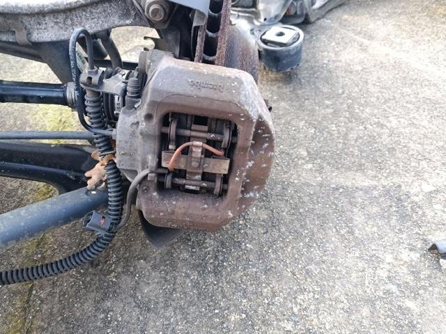 Pinza de freno trasera izquierda 7L6615423J VAG