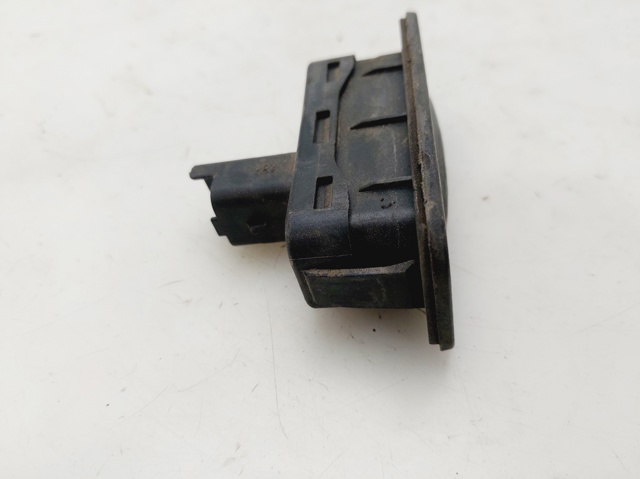 8200076258 RENAULT Botón de accionamiento del cierre de la tapa del maletero (puerta trasera 3/5)  en stock Gandía