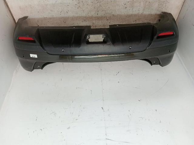 Defensa trasero 850224CC0H NISSAN