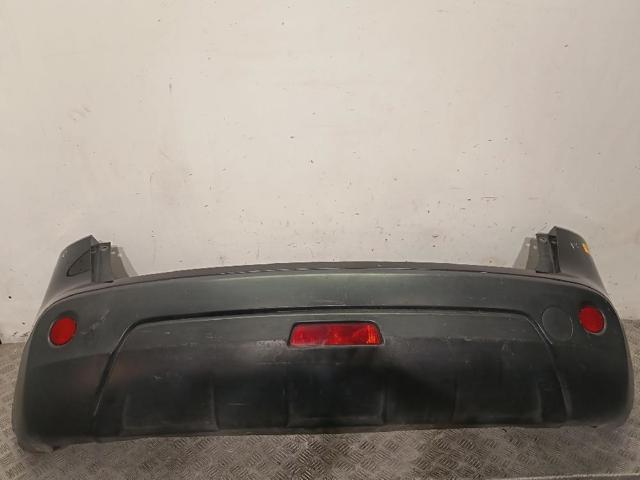 Defensa trasero 85022JD00H NISSAN