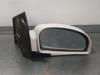 Espejo retrovisor derecho 876201C310 HYUNDAI