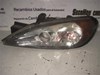 Faros delantero izquierdo 89003044 NISSAN