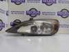 Faros delantero izquierdo 89003044 NISSAN