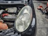 Faros delantero izquierdo 89007101 NISSAN