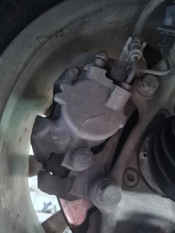 Pinza de freno trasera izquierda 8W0615403 VAG
