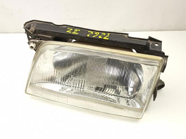 Faro delantero izquierdo 90008019 OPEL