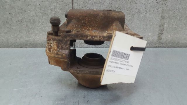 Pinza de freno trasera izquierda 90297534 OPEL