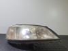 Faro derecho 90520878RH OPEL