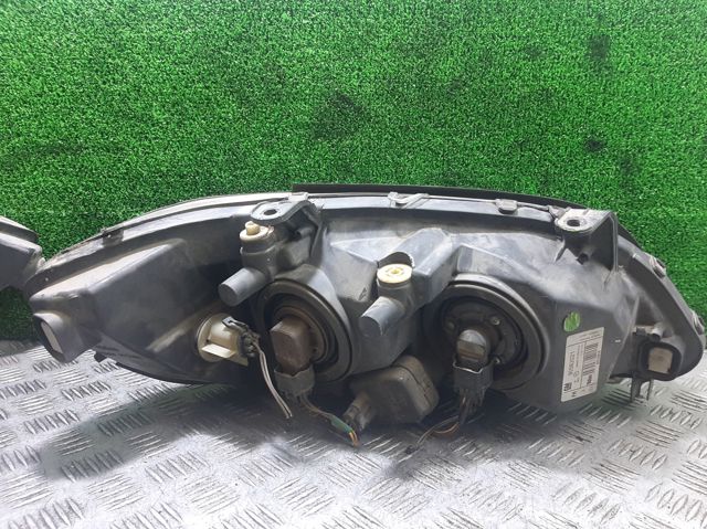 Faros delanteros 90582021 OPEL