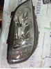 Faro derecho 90582022 OPEL