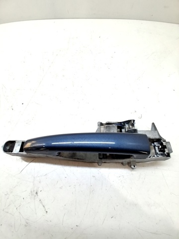 910958 Soporte de manija exterior de puerta delantera izquierda  en stock Sabadell