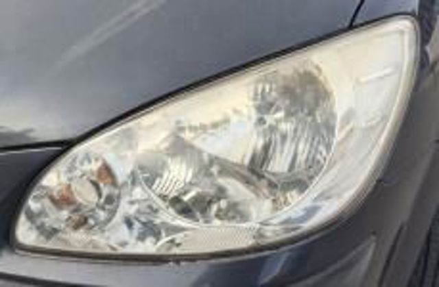Faro delantero izquierdo 921011C510 HYUNDAI