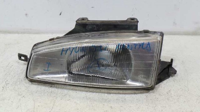 Faro izquierdo 9210129070 Hyundai/Kia