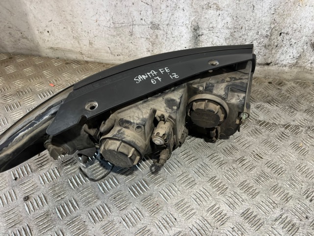 Precio del repuesto Faros delantero izquierdo Santa Fe II SUV