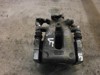 Pinza de freno trasero derecho 93183697 OPEL