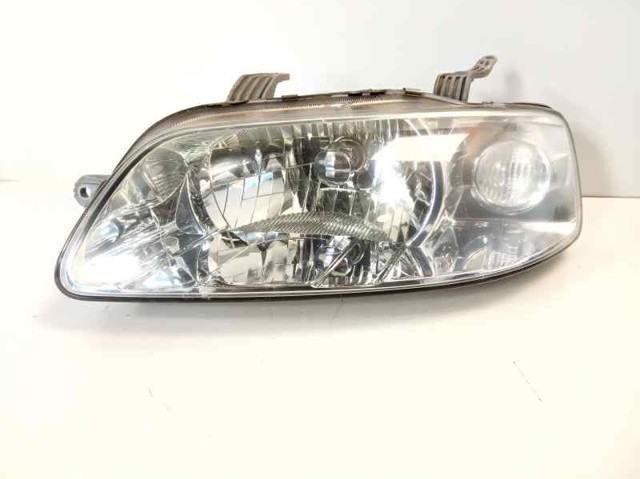 Faro delantero izquierdo 95016740 GM