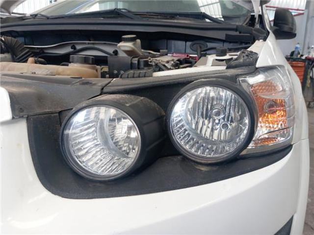 Faro izquierdo Chevrolet Aveo 3 T300