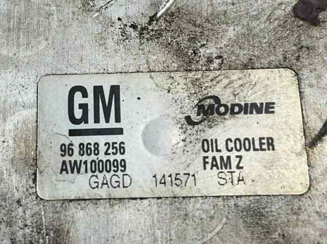 Radiador de aceite debajo del filtro 96868256 GM