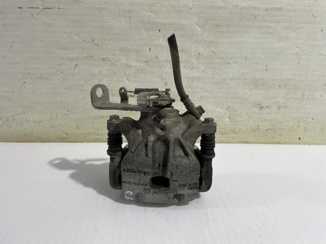 Pinza de freno trasera izquierda B4Y72699ZA MAZDA