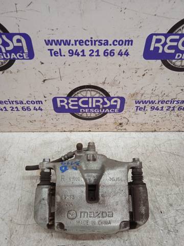 Pinza de freno delantera derecha B4Y73398ZB Mazda