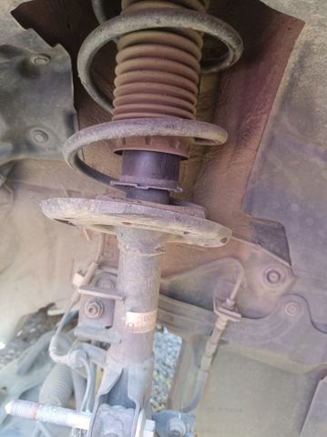amortiguador frontal derecho DD1V34700B MAZDA