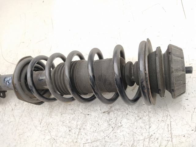 Amortiguador eje delantero izquierda E43031HA3A NISSAN