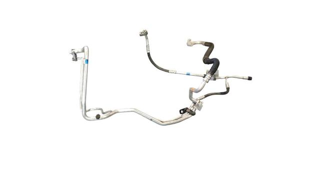 F1F119D567AB FORD Manguera de aire acondicionado de condensador a evaporador  disponible Alicante