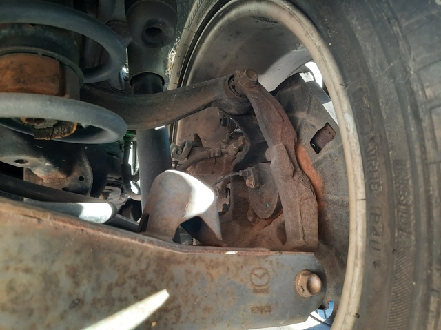 Pinza de freno trasera derecha GJZA2698ZC MAZDA