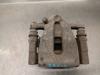 Pinza de freno trasera izquierda LR001026 LAND ROVER