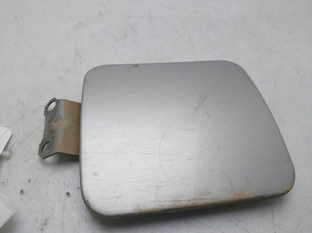 Tapa exterior de tanque combustible Mitsubishi L 200 (1996-2007)