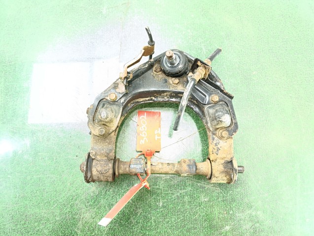 MR296093 MITSUBISHI Brazo superior izquierdo de la suspensión delantera comprar Alcalá