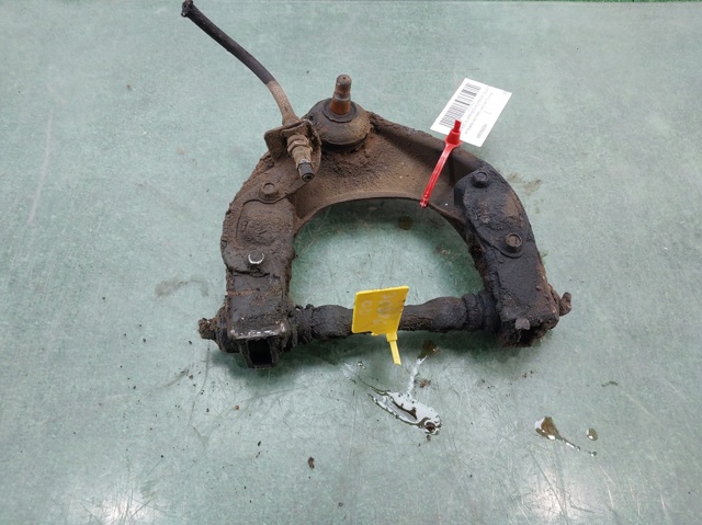 MR296094 MITSUBISHI Brazo superior derecho de la suspensión delantera comprar Bilbao