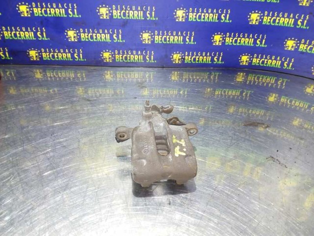 Pinza de freno trasera izquierda NVE7561 VAG