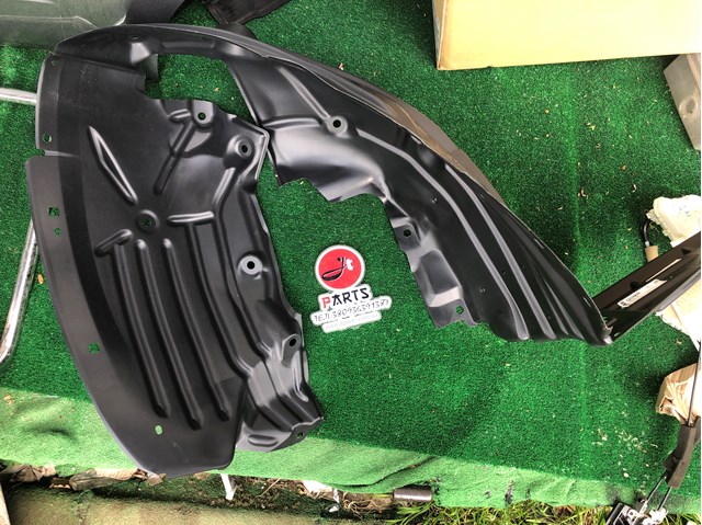 Paso de rueda Mazda D10E56130B
