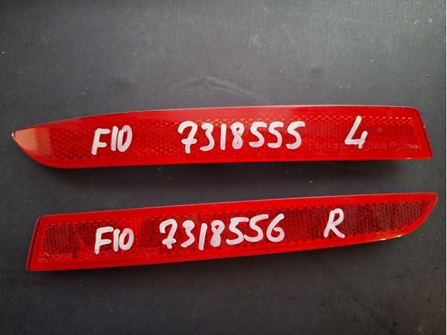 7318555 BMW Reflector, paragolpes trasero, izquierdo