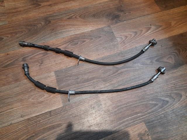 2443774 Ford tubo flexible de frenos trasero