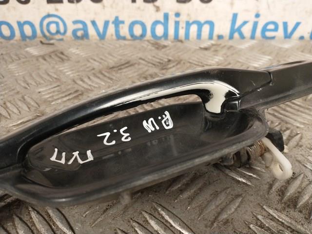 Manija exterior derecha de puerta delantera MR556248 Mitsubishi