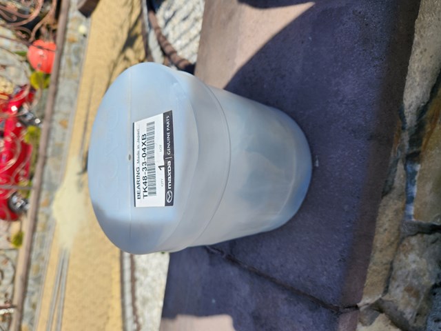 TK483304XB Mazda Cubo delantero