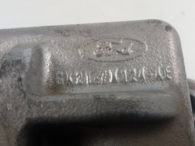 GK217M124AE Ford Soporte de caja de velocidades