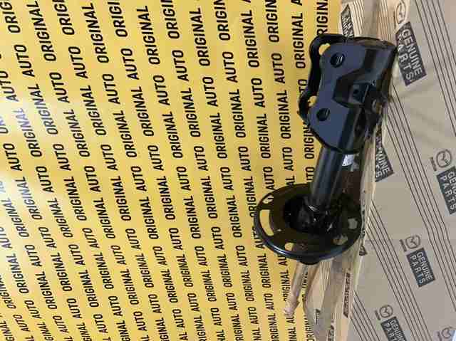 Amortiguador delantero izquierdo Mazda KN1C34900A precio, desde 288,91 EUR