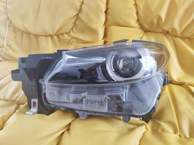 TM5551041B Mazda faro izquierdo